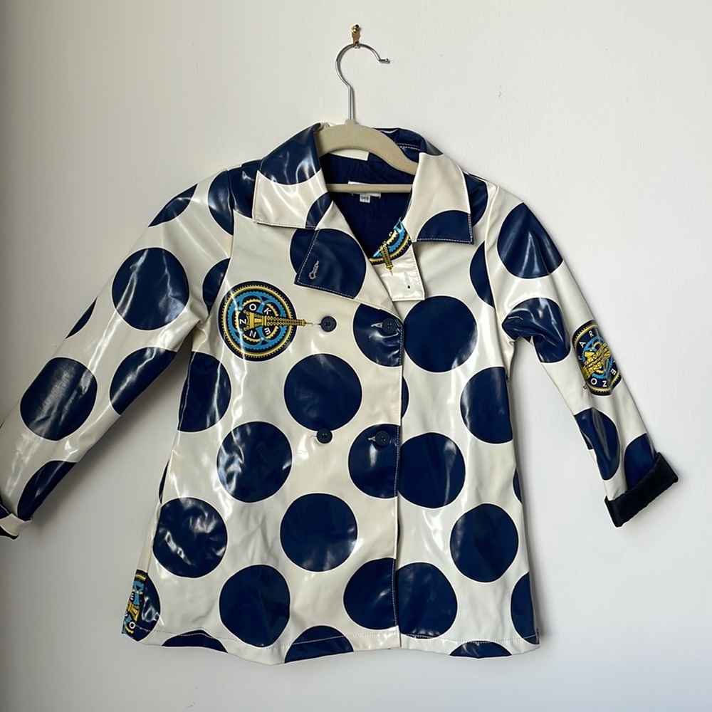 Kenzo Kids bold and playful raincoat with matching bucket hat.